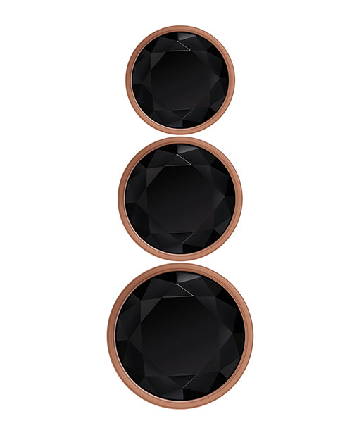 Juego de enchufes de 3 piezas en oro rosa y negro de lujo Gender X Product Image.