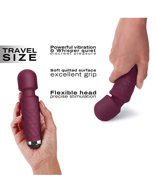 Estimulador de clítoris Dorcel Mini Wanderful Plum: tu compañero de viaje perfecto Product Image.